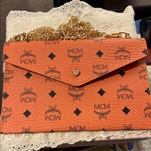MCM Orange Clutch with Gold Chain